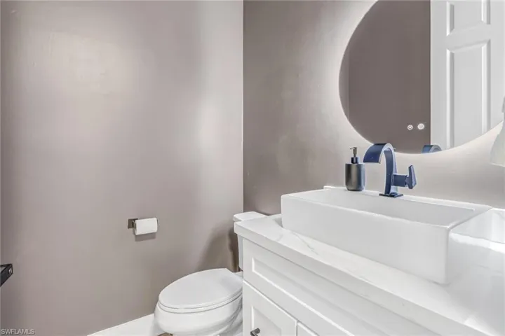 Bathroom featuring toilet and vanity