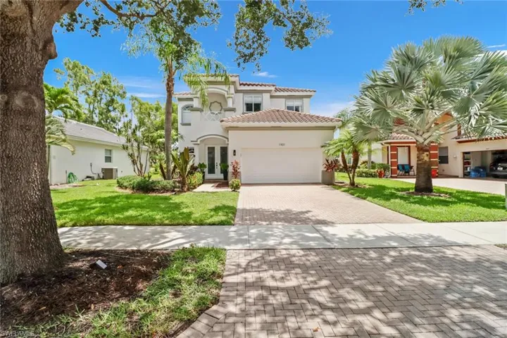 Mediterranean / spanish house featuring a front yard