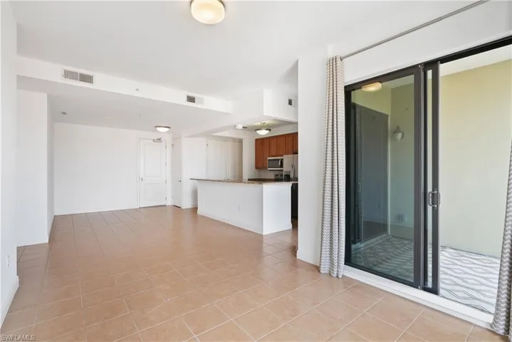 Spare room with light tile patterned floors