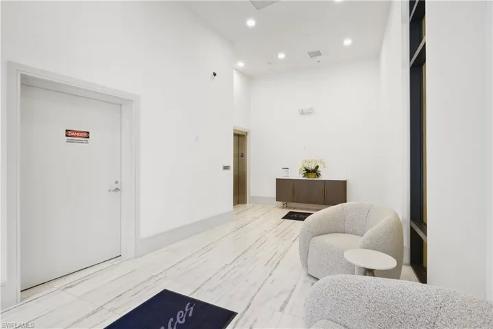 Hallway with a towering ceiling