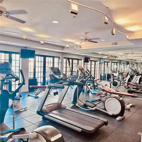 Exercise room featuring ceiling fan