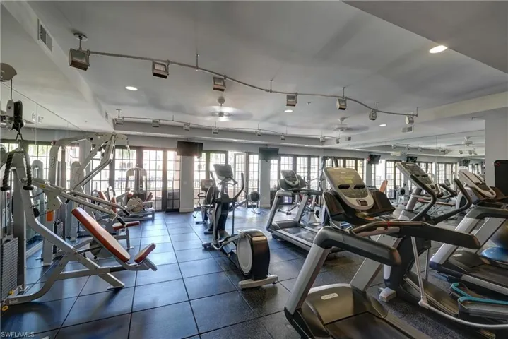 Workout area featuring ceiling fan