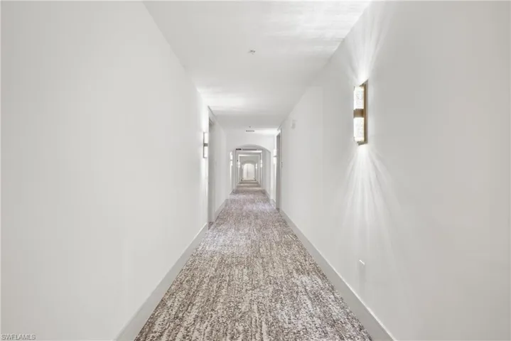 Hallway with carpet