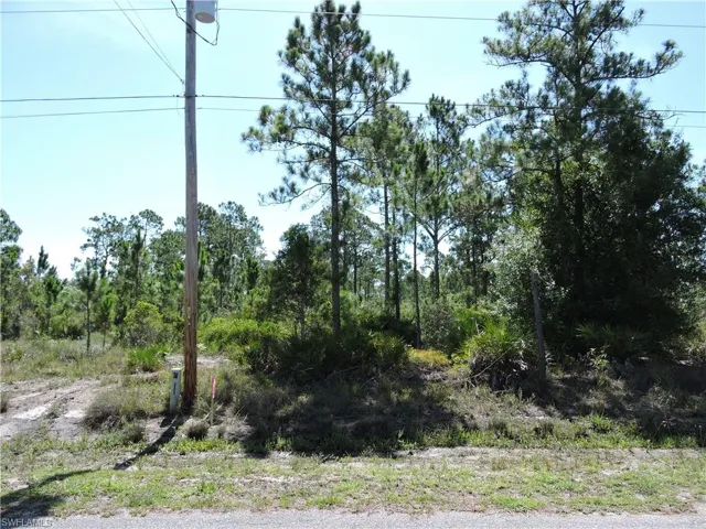 Left front corner view shows power, phone, utility location
