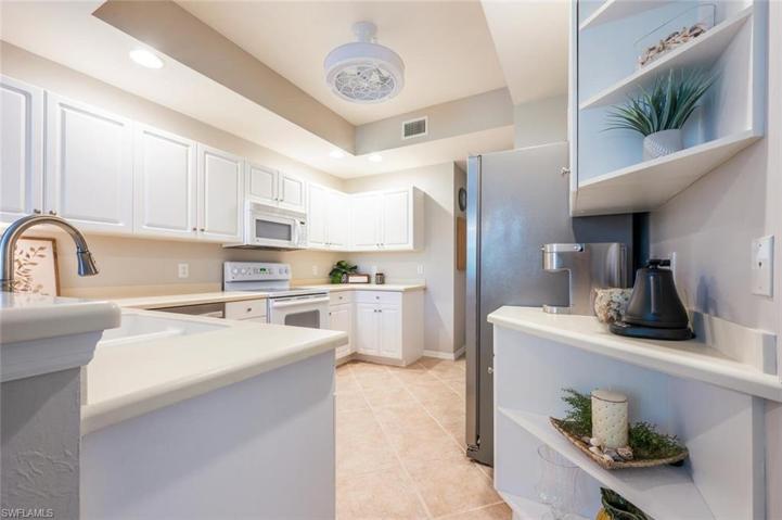 Kitchen with Trey Ceiling and Plenty of Cabinet Space!