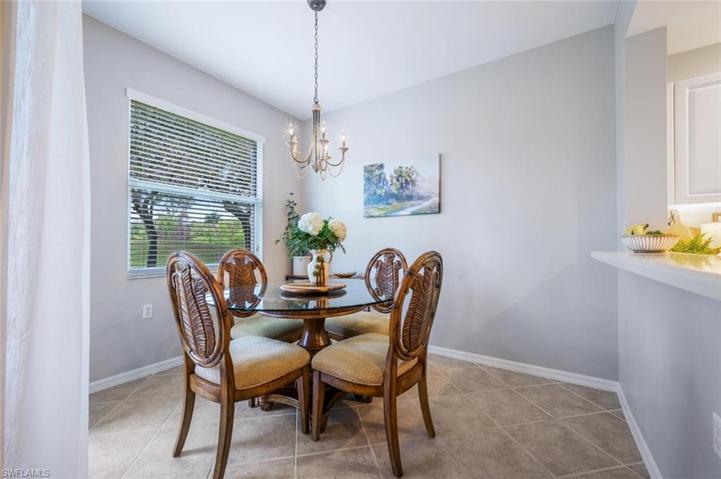 Dining area off the kitchen with Golf Course View and Sliders to the Lanai