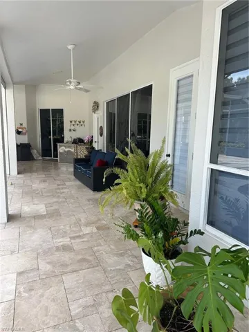 View of patio / terrace featuring a ceiling fan