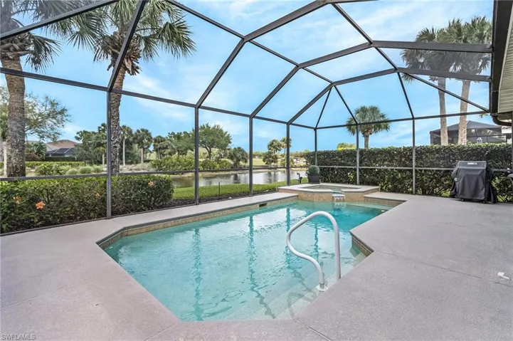 Pool and spa have a water to golf course view. Plenty of room for entertaining in this back yard oasis.