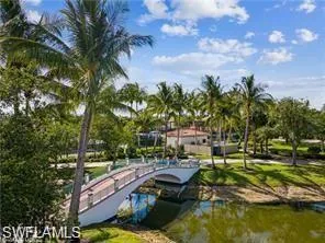 5715  Drummond  WAY, Naples, FL 34119