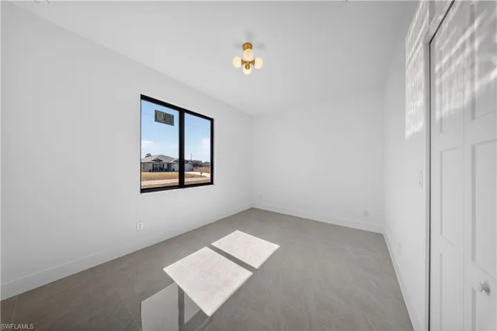 Empty room with baseboards