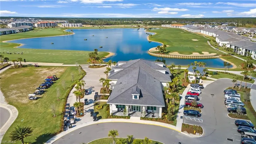 Birds eye view of Pro Shop with driving range and golf course view