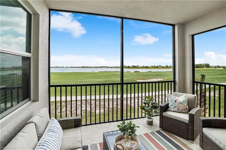 Sunroom with a water view
