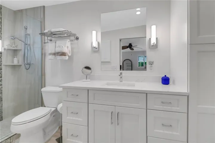 Master Bathroom with custom linen/storage cabinet