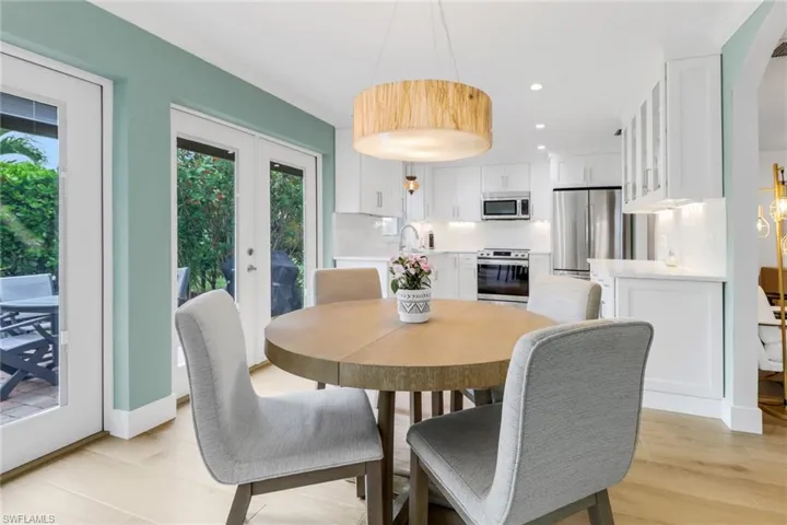 Dining area opens to Kitchen and Living Room