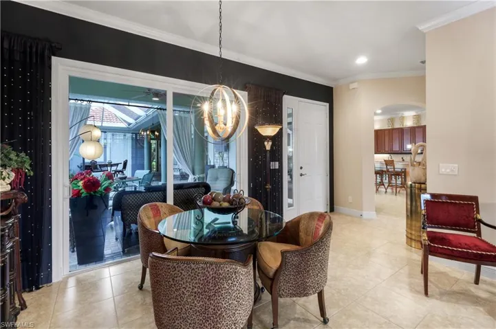 DINING SPACE OR GAME TABLE-YOUR CALL...SLIDERS OUT TO COURTYARD AS WELL