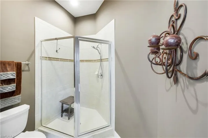 PRIVATE WALK IN SHOWER AND WATER CLOSET COMBINED-DECO TILE