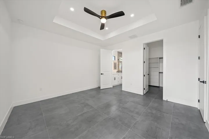 Spacious primary suite designed with comfort and sophistication in mind