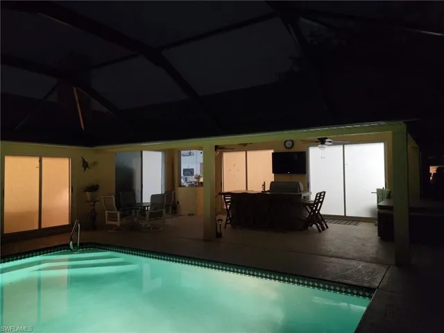 Evening View of swimming pool and under truss area
