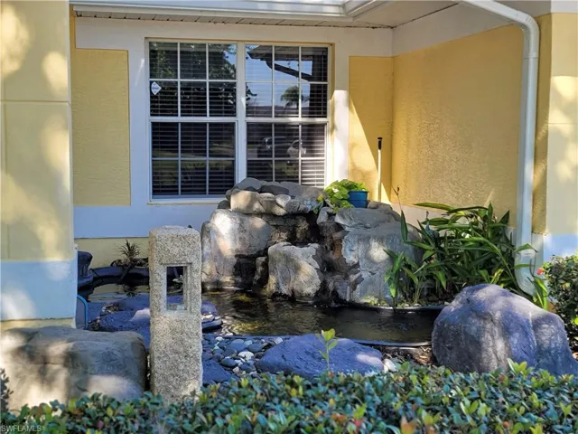 Koi pond with waterfall feature.