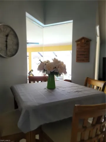 View of breakfast area with disappearing-edge window