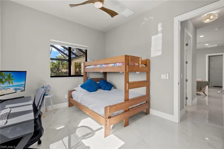 Bedroom featuring ceiling fan