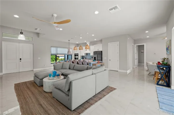 Living room featuring ceiling fan