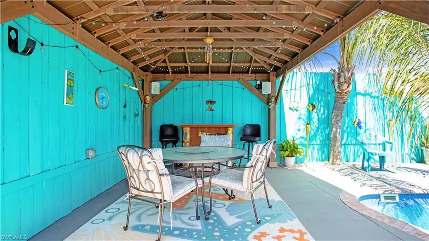 View of patio / terrace featuring outdoor dining area and a gazebo