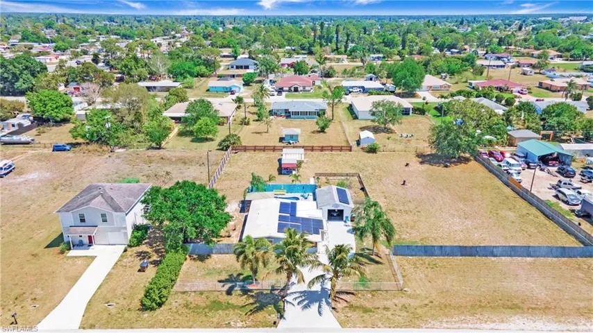 Aerial view featuring a residential view with added lot available