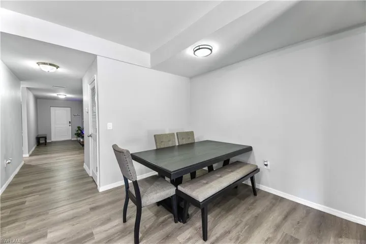 Dining area featuring wood-type flooring