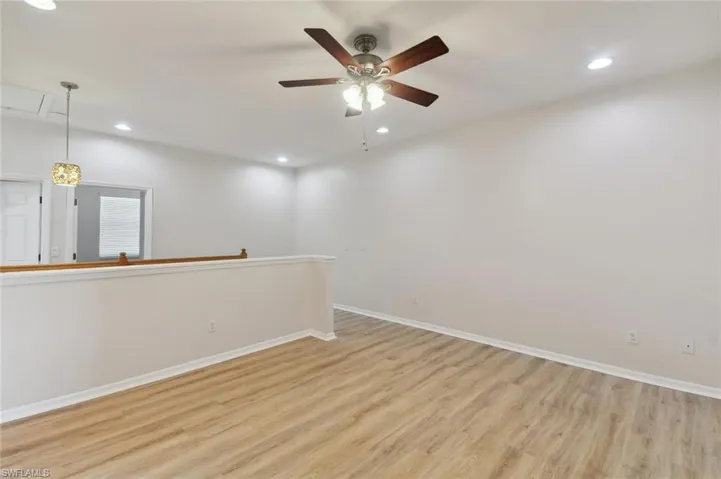 Unfurnished room featuring light hardwood / wood-style floors and ceiling fan