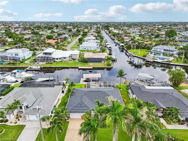 Aerial view of residential area with a large body of water