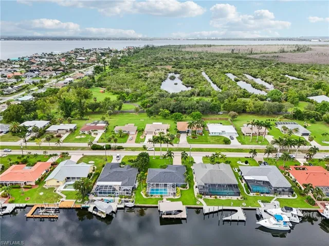 Aerial view of residential area with a nearby body of water