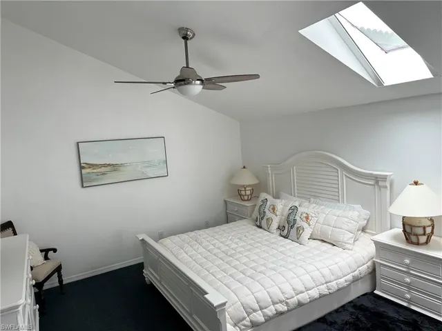 King bed, vaulted ceiling, remote skylight and ceiling fan