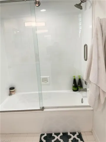 Primary Bathroom on first level has tub/shower