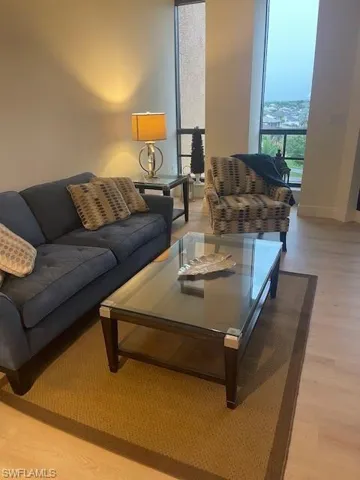 Living area featuring light wood-type flooring