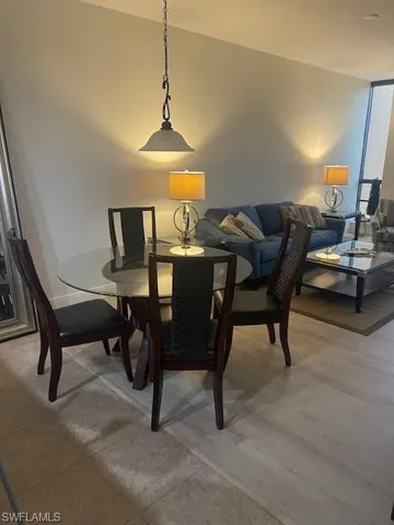 Dining room featuring light tile patterned flooring