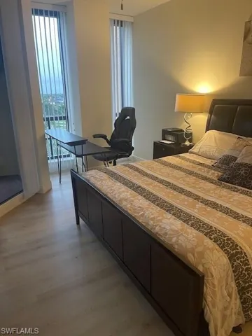 Bedroom with light wood-style flooring