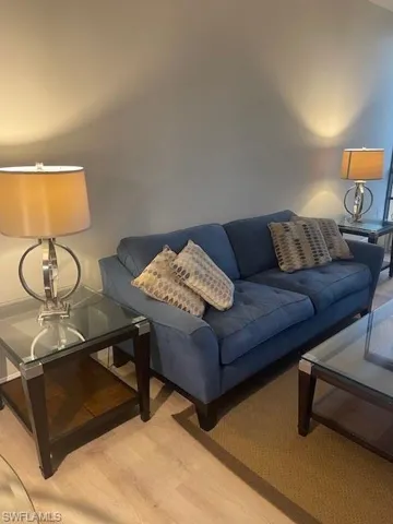 Living area with light wood-style flooring