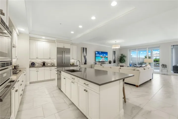 Kitchen opens directly to great room for easyentertaining.
