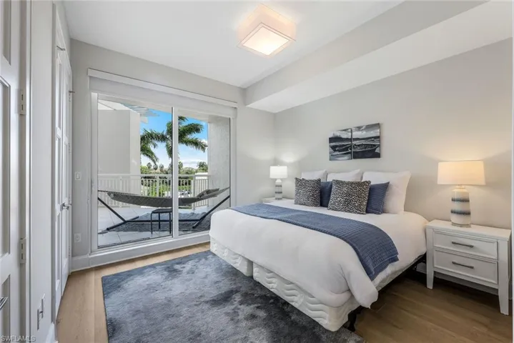 Second guest bedroom also with gorgeous wood flooring, en suite bathroom and outdoor access.