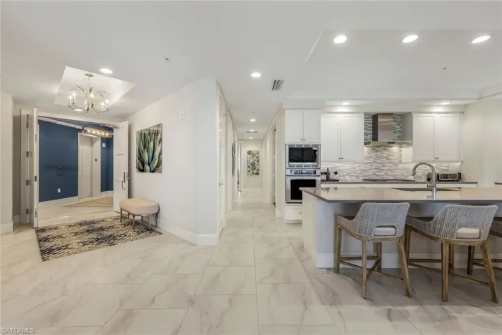 Enter your home through a private elevator foyer.