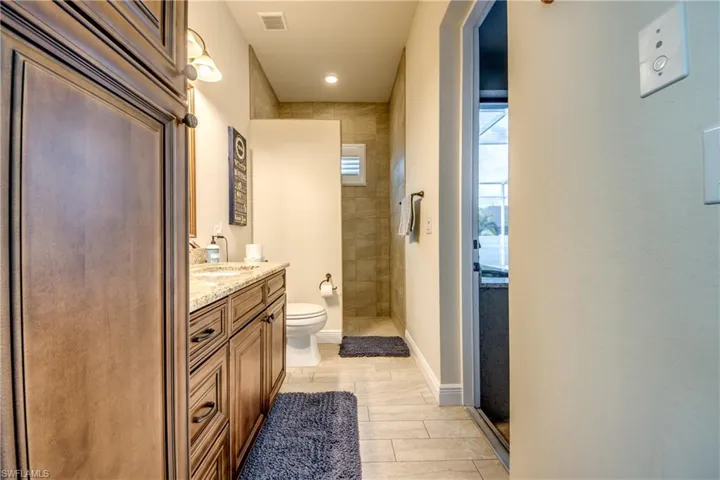 Full bath with vanity and walk in shower