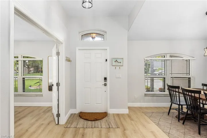 Foyer featuring light hardwood / wood-style floors and plenty of natural light