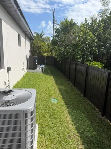Fully fenced in yard Bronze colored aluminum.