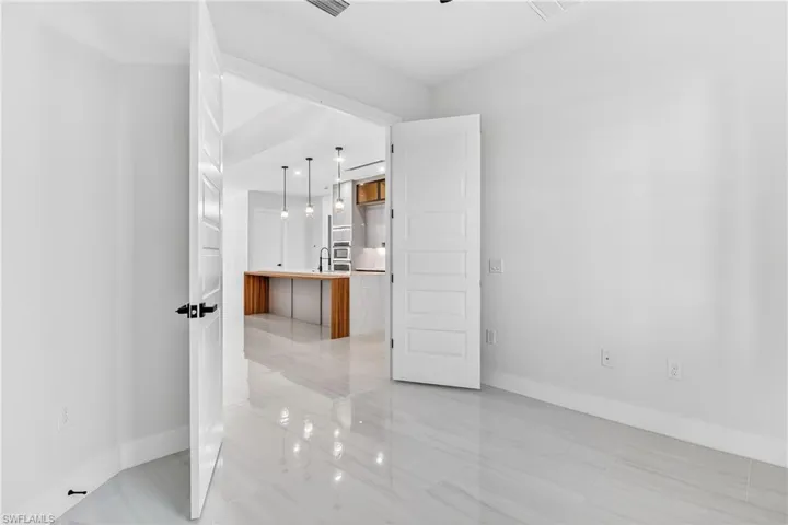 Den or office with double doors