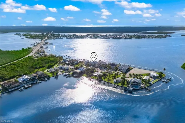 Location, location, location!  Street of dreams with the best boating access to all the waterways and an island lifestyle yet still close to shopping and Cape Coral.