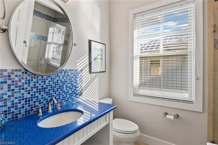 Guest bathroom # 2 with beautiful blue accents and walk in shower!