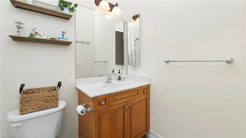 2nd Bathroom with vanity and toilet
