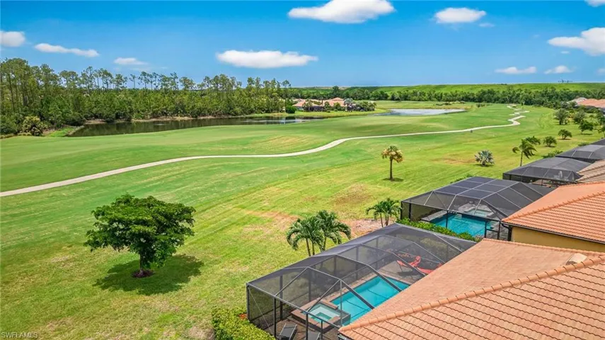 Aerial view of a golf club and a nearby body of water