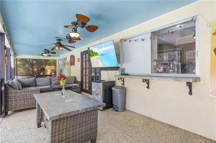 View of patio / terrace featuring an outdoor hangout area and ceiling fan
